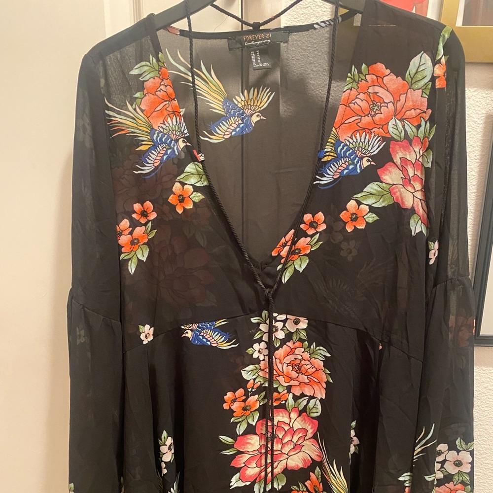 Forever 21 high and low sheer beautiful blouse with a lace up tassel
